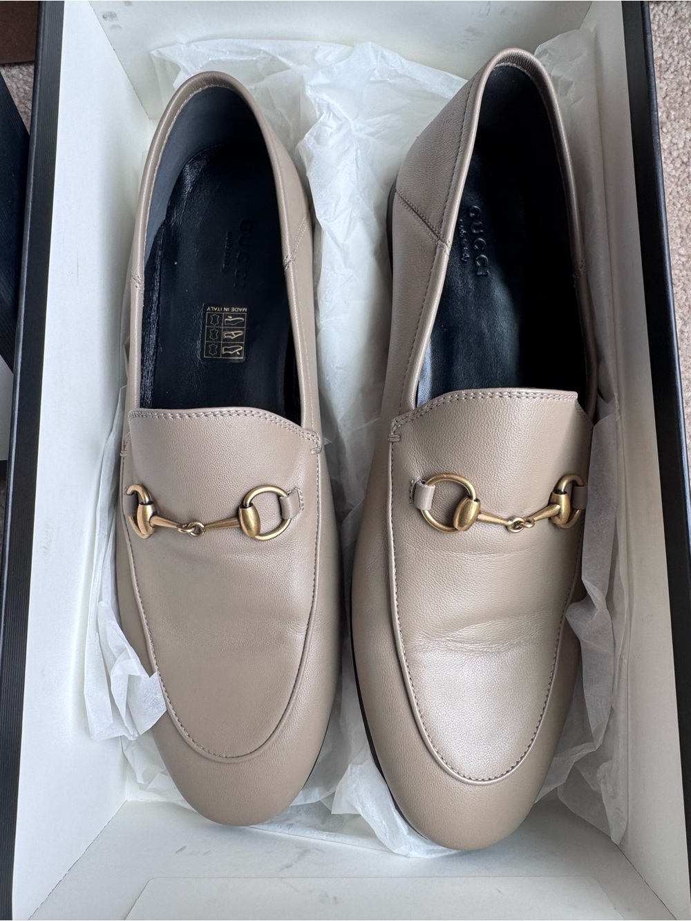 Gucci Brixton Leather Horsebit Loafers in the classic taupe/mud colorway.